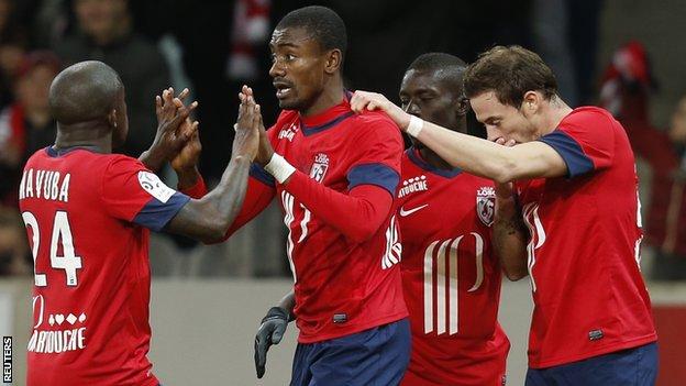 Former Chelsea forward Salomon Kalou celebrates scoring in Ligue 1 for Lille
