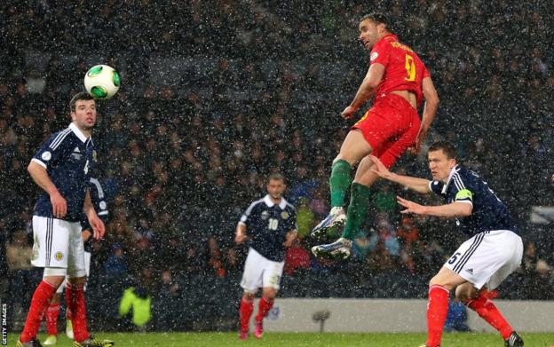 Hal Robson Kany scored Wales' winner at a snowy Hampden Park to secure a World Cup qualifying win over Scotland.