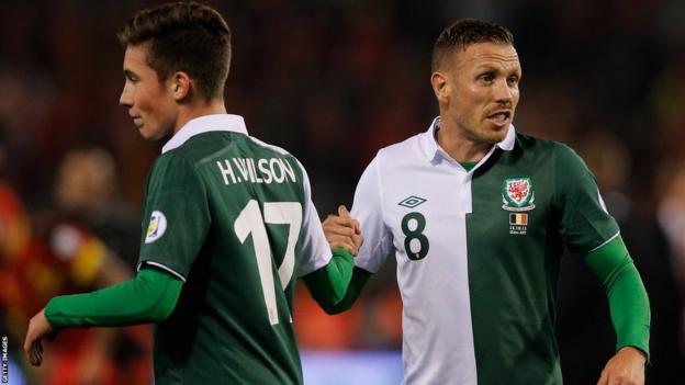 Out with the old, in with the new: Liverpool’s Harry Wilson at 16 became Wales’ youngest ever player on the same evening Craig Bellamy made his final appearance for the national team in a 1-1 draw in Belgium.