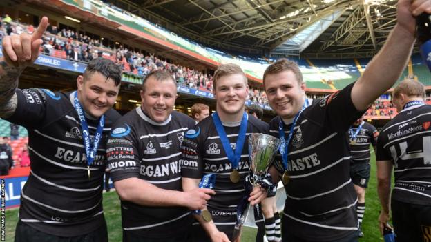 Pontypridd players celebrate following their side’s 34-13 win over Neath in the Swalec Cup final at the Millennium Stadium.