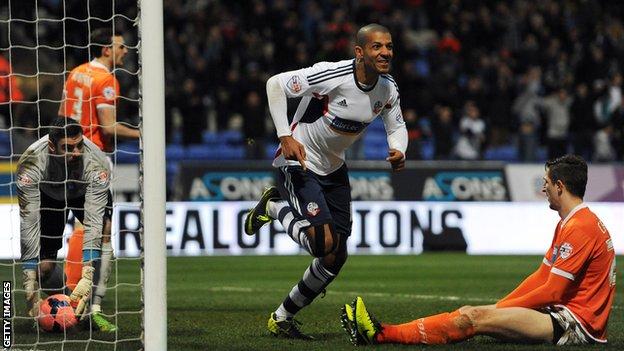 Bolton striker Jermaine Beckford celebrates scoring Bolton's winner against Blackpool