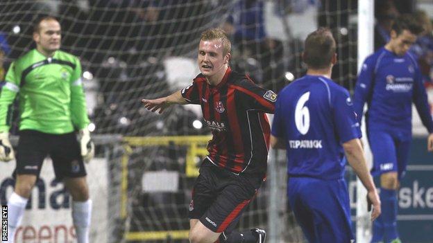 Jordan Owens celebrates scoring the opener against Dungannon