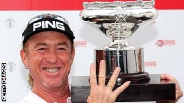 Miguel Angel Jimenez celebrates victory in the Hong Kong Open play-off