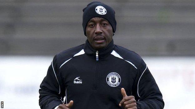 Russell Latapy warms up with Edinburgh City
