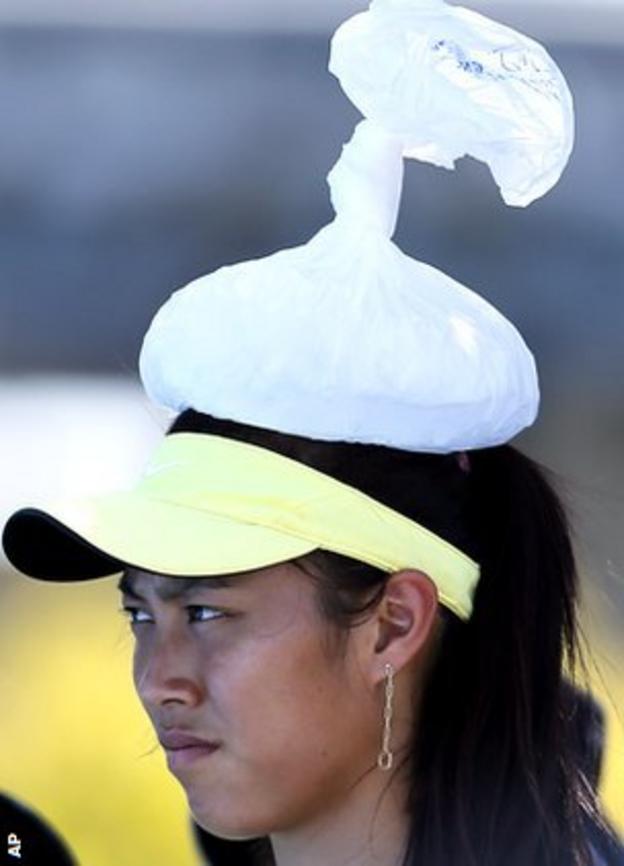 Chan Hao-ching cools off with an ice pack on her head