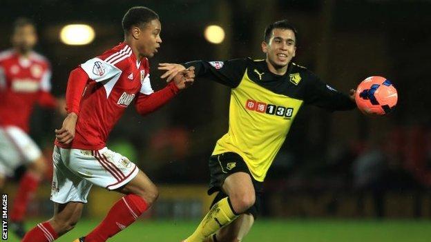 Bobby Reid of Bristol City and Cristian Battocchio of Watford