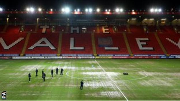 The Valley's rain-soaked pitch