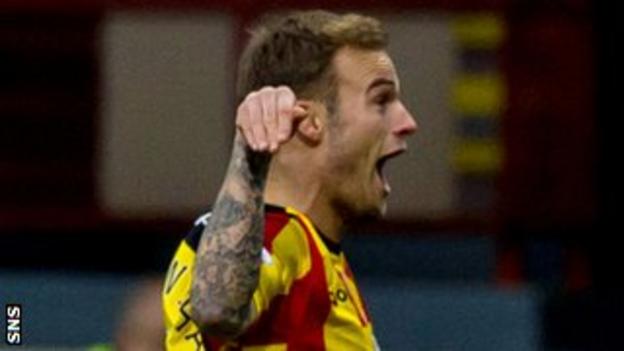 Partick Thistle's Kallum Higginbotham celebrates after scoring against Kilmarnock