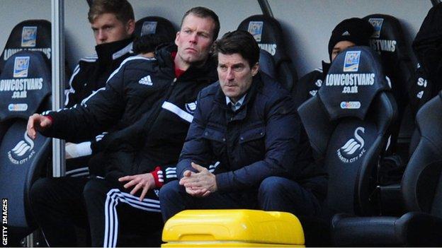 Michael Laudrup looks on from the dugout as Swansea lose at home to Tottenham