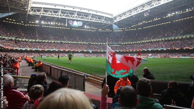 Fans watching Wales v England in the Euro 2012 qualifiers at the Millennium Stadium