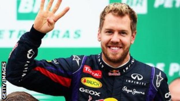 Sebastian Vettel celebrates his fourth World Championship after victory at the Brazilian Grand Prix.