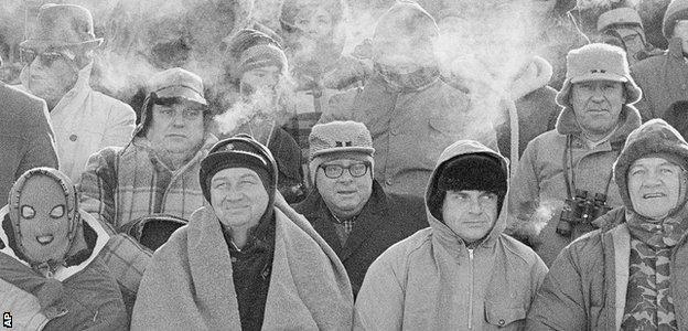 Fans struggle to keep warm during the original Ice Bowl