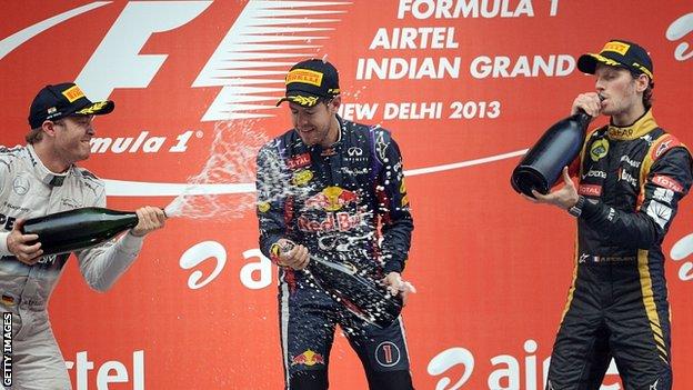 Sebastian Vettel is drenched in champagne