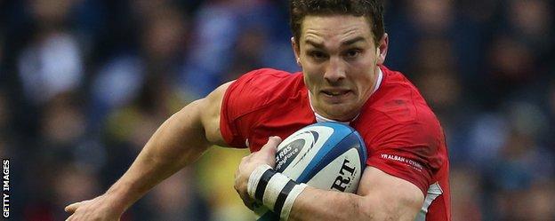 Wales wing George North runs with the ball