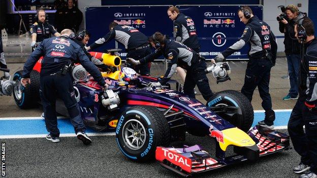 Red Bull's Daniel Ricciard is pushed back into his team garage during day four of testing in Jerez, Spain.