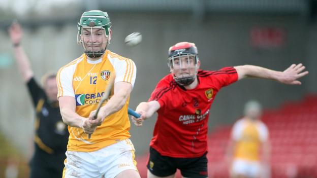 Antrim's Paul Shiels and Down's Ryan Brannigan in action during the 2013 Ulster Hurling final which Antrim won by 4-21 to 1-17