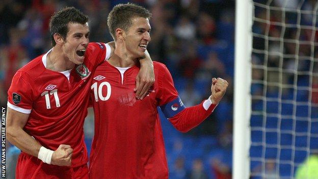 Gareth Bale and Aaron Ramsey in action for Wales