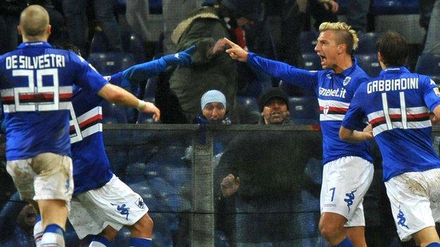 Sampdoria striker Maxi Lopez celebrates his goal against Genoa