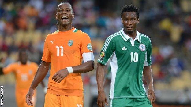 Ivory Coast's Didier Drogba and Nigeria's John Mikel Obi