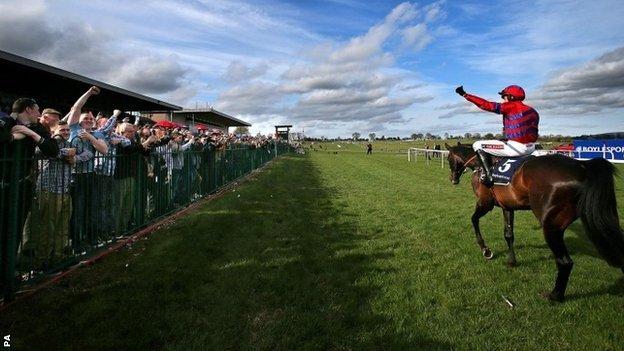 Jockey Barry Geraghty and Sprinter Sacre after winning at Punchestown in April