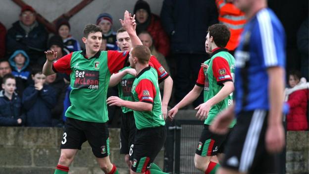 Marcus Kane is congratulated after scoring Glentoran's goal against Armagh City at Holm Park