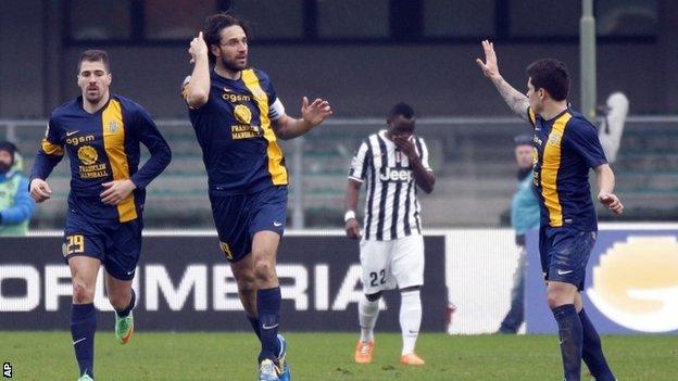 Luca Toni celebrates
