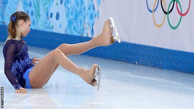 Yulia Lipnitskaya of Russia falls while competing in the women's short programme
