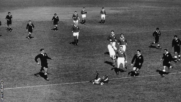 Ken Scotland spills the ball in the act of scoring for the Lions against the New Zealand Maori in 1959