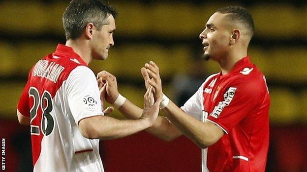 Monaco's French defender Layvin Kurzawa (right) celebrates with midfielder Jeremy Toulalan