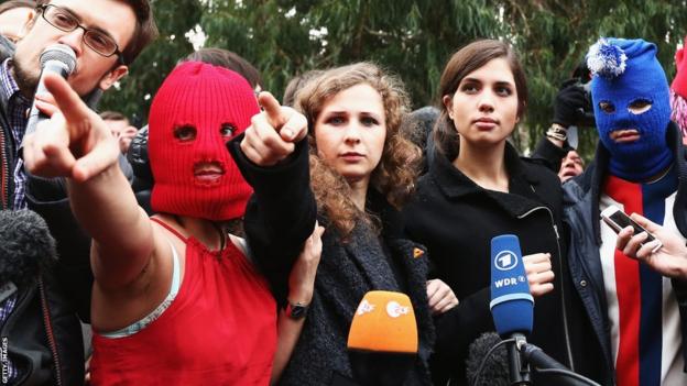 Members of protest group Pussy Riot speak during a press conference on February 20, 2014 in Sochi, Russia.