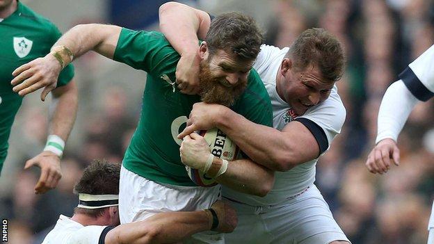 Gordon D'Arcy is tackled by Dylan Hartley in Saturday's clash at Twickenham