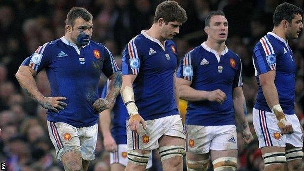 France players look dejected during their defeat by Wales in Cardiff