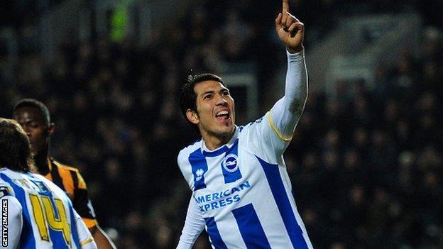 Leonardo Ulloa celebrates after scoring for Brighton against Hull City