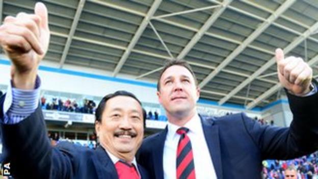 Vincent Tan and Malky Mackay celebrate