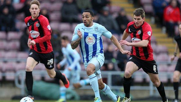 Coventry striker Callum Wilson breaks clear of the Shrewsbury defence at Sixfields