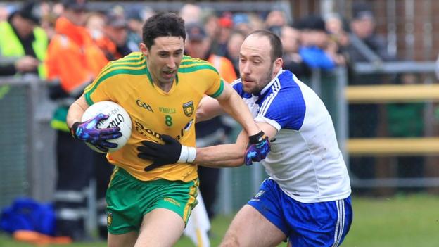 Donegal's Rory Kavanagh peels away from Monaghan's Gavin Doogan during the Division Two Ulster derby clash