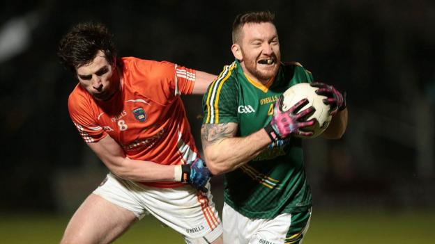 Armagh's Aaron Findon gets to grips with Meath's Michael Burke during the Division Two encounter on Saturday night