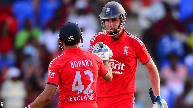 Ravi Bopara and Stuart Broad celebrate England's win v West Indies