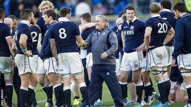 Scott Johnson congratulates his Scotland players after the win over Italy