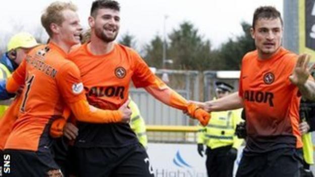 Nadir Ciftci (centre) celebrates Dundee United's second goal against Inverness with Gary Mackay-Steven (left) and Paul Paton (right).