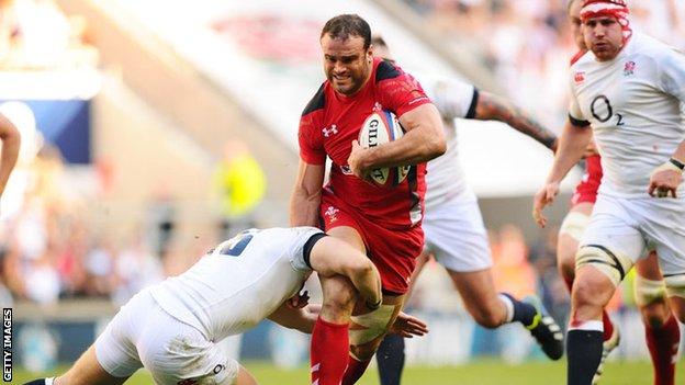 Jamie Roberts is tackled by
