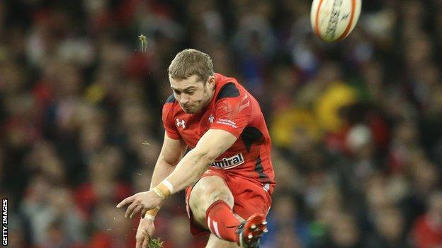 Leigh Halfpenny kicks for goal while playing for Wales