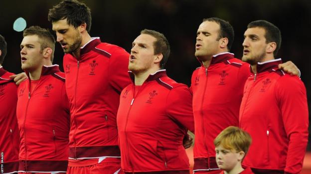 Gethin Jenkins, winning a record breaking 105th cap for Wales, lines up with his team-mates ahead of the final Six Nations match of the season against Scotland in Cardiff.