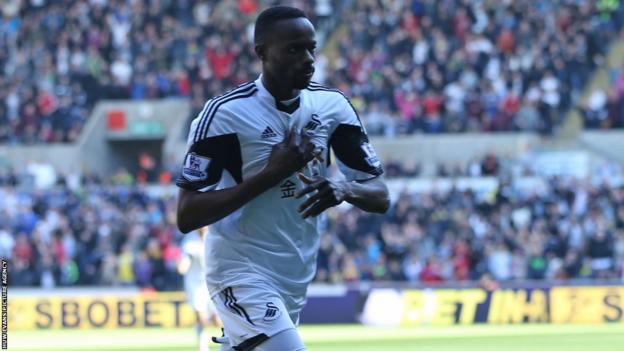 Roland Lamah celebrates after giving Swansea City an early lead in the crucial Premier League match against West Brom at the Liberty Stadium.