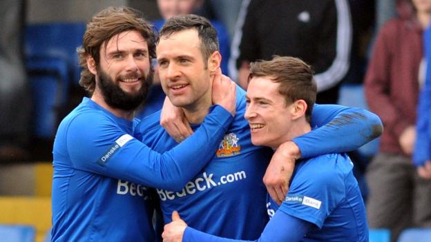Glenavon player-manager Gary Hamilton congratulates Ciaran Martyn after his second goal ensured a 3-1 win over Coleraine