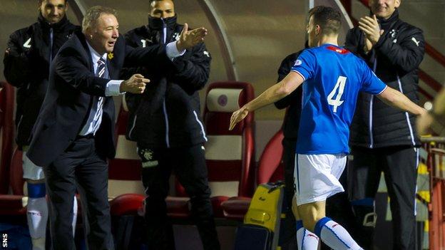 Ally McCoist celebrates with Fraser Aird as Rangers defeat Albion Rovers 2-0