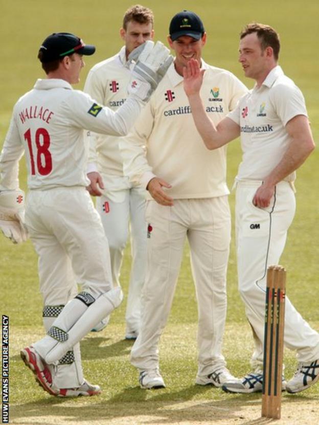 Jim Allenby congratulates Graham Wagg for taking a wicket in their pre-season game against Gloucestershire