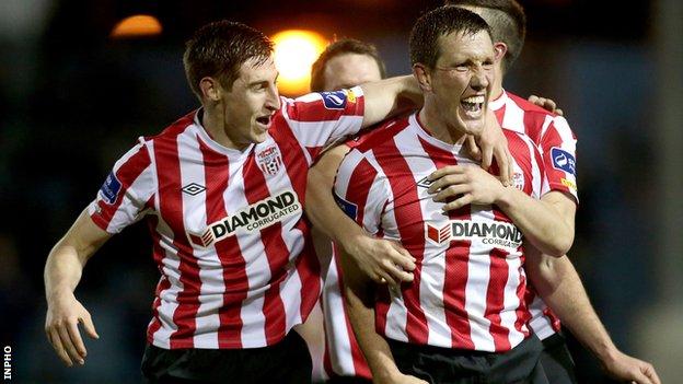 Cliff Byrne (right) is congratulated after his Derry equaliser at United Park