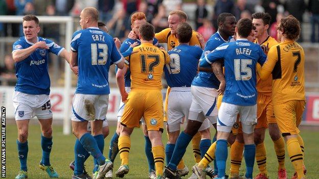 A poor tackle from Adam Chapman, which saw the Newport man sent off, spark a melee with the Portsmouth players