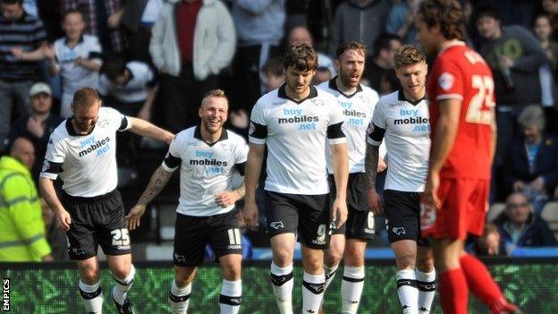 Derby County players celebrate Johnny Russell's goal